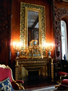 One of many ornate fireplaces